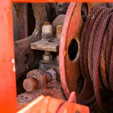 Close-up of an industrial winch and steel cable
