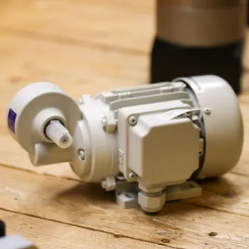 Industrial electric motor on a workshop bench